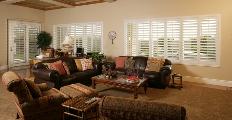 Chicago sunroom with french door shutters.